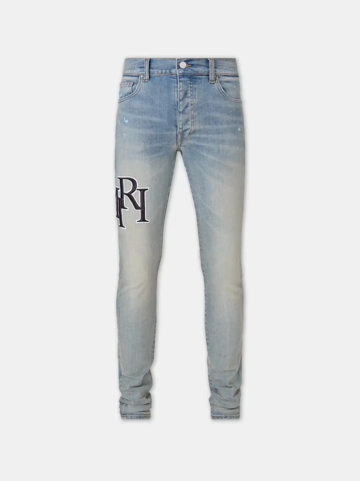 Jean Skinny logo décalé indigo vintage Amiri-influensse